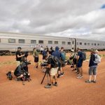 Crew set up outside the Ghan near Coober Pedy.