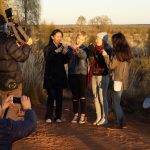 Filming students for 'We Are Young' at Uluru.
